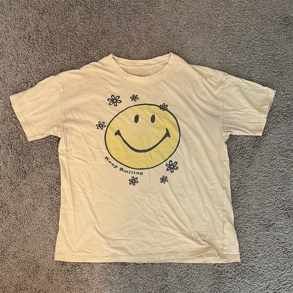 American Eagle Outfitters Cream and Yellow Smiley Face Tee